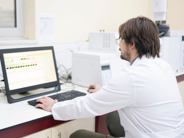 Researcher looking at data.