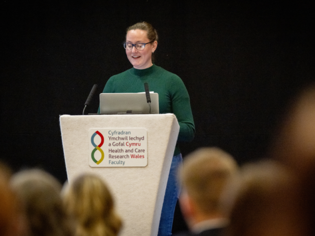 Woman speaking at a conference