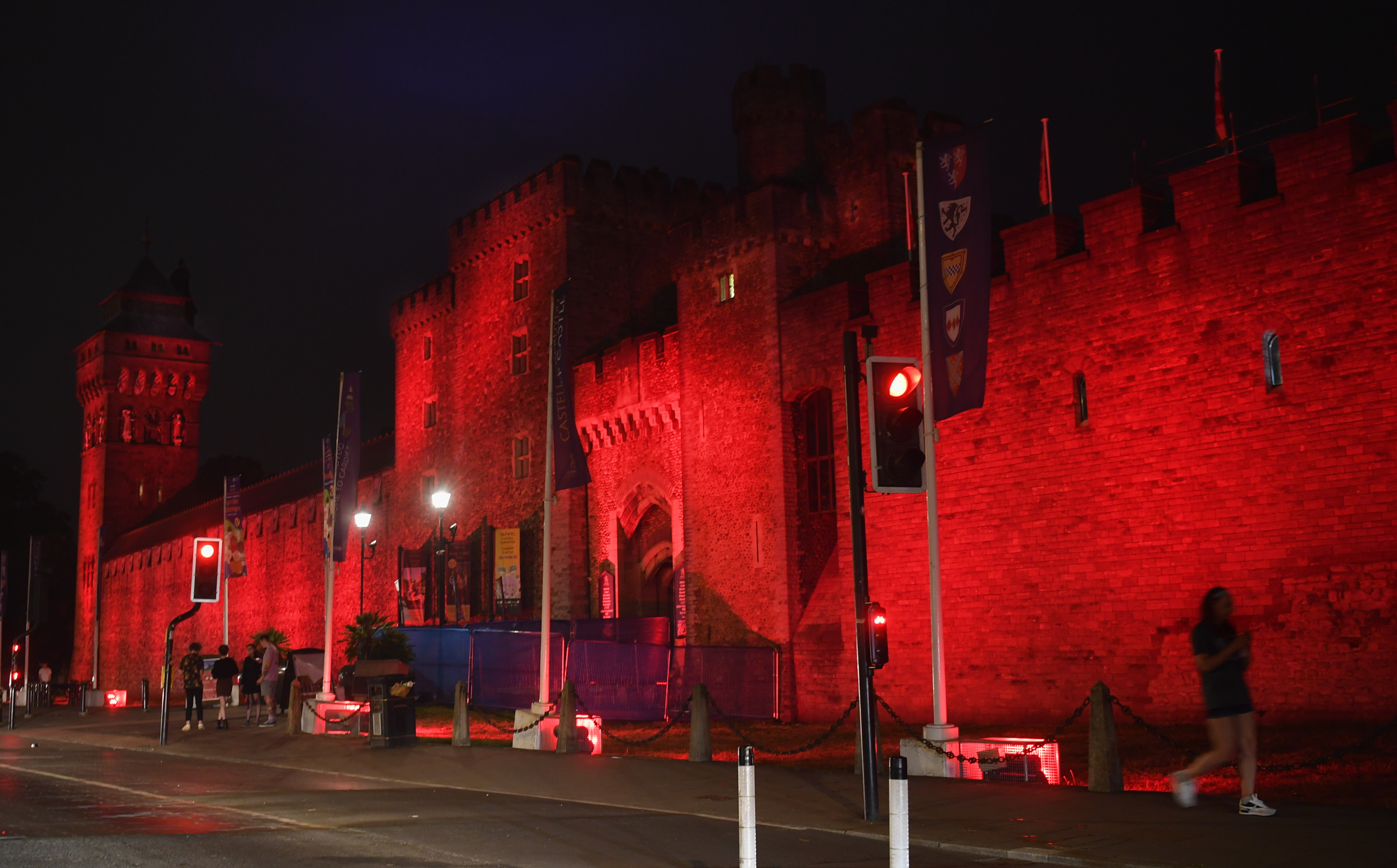 Cardiff Castle at night lit up in red for #Red4Research day 2022