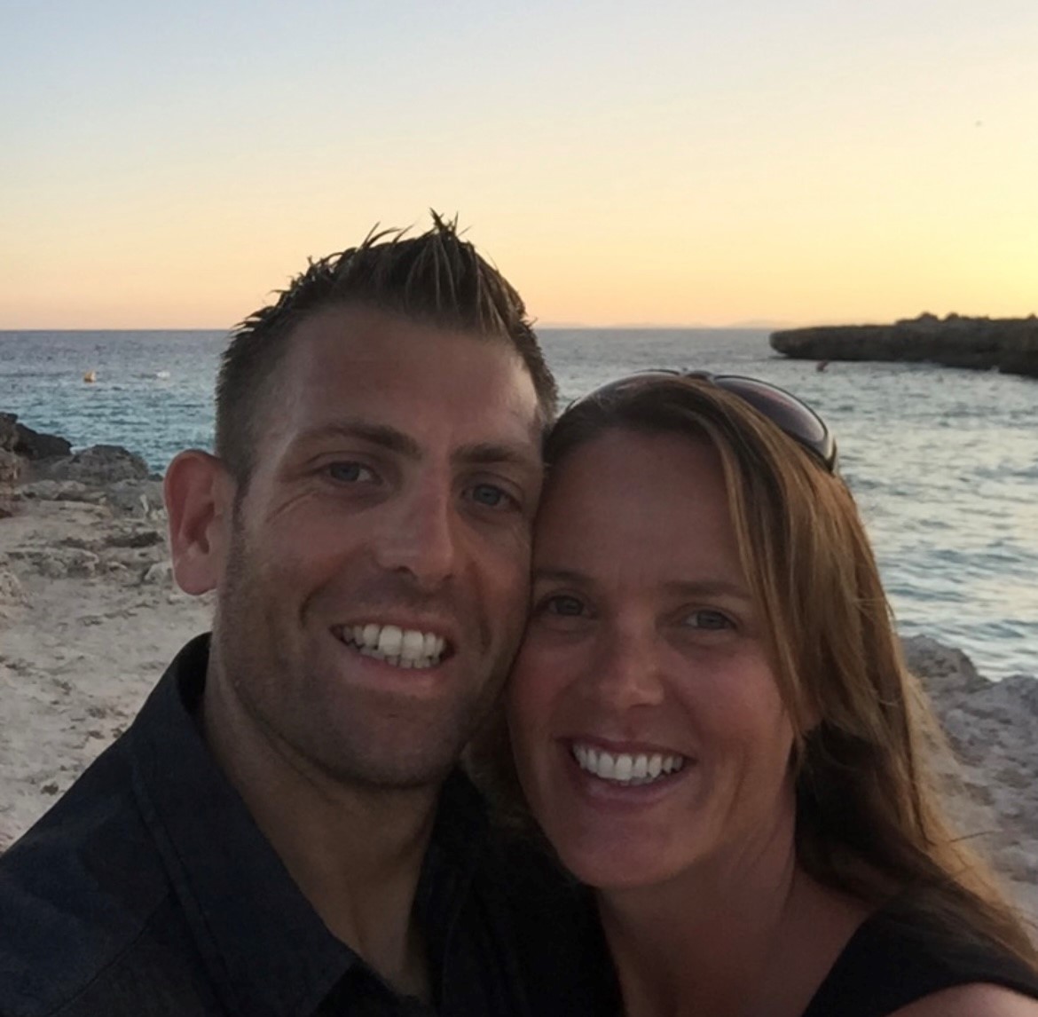 Leigh with his wife on the beach