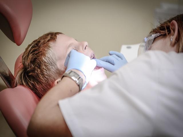 Child receiving dental care