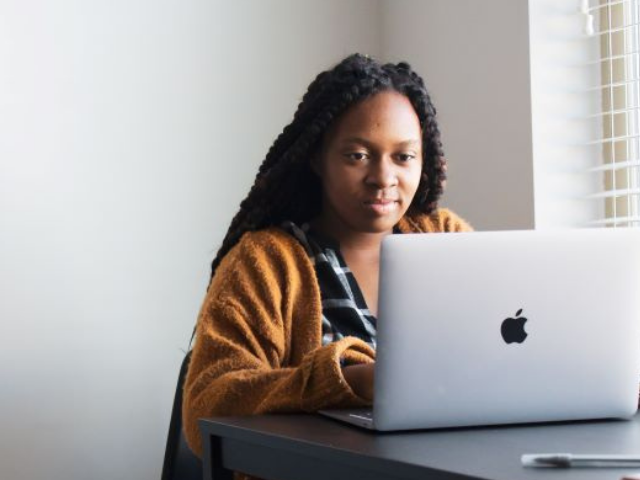 Woman working at a laptop