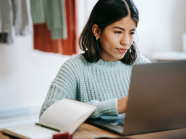 Woman working at a laptop