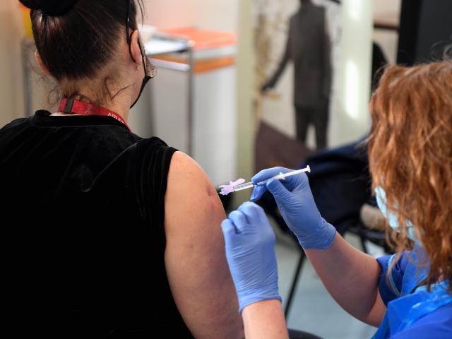 Woman having a vaccine