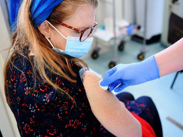 Woman preparing for vaccine