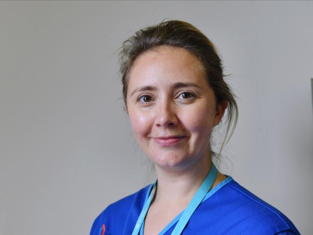 Research nurse smiling at the camera