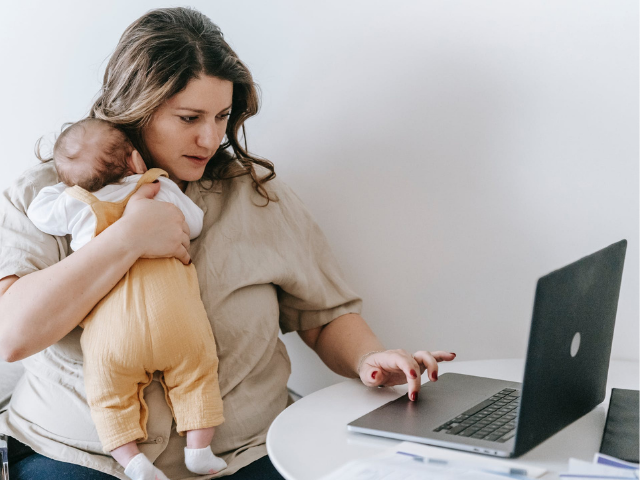 Mum with baby and laptop