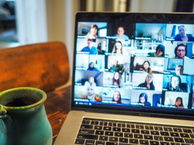 Laptop showing online meeting