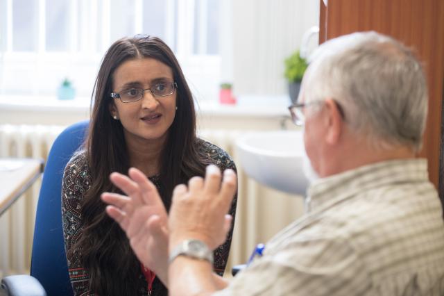 Doctor talking to patient