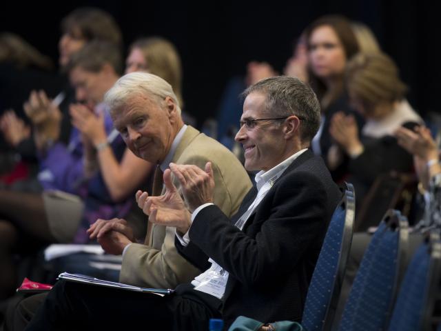 Audience clapping at event