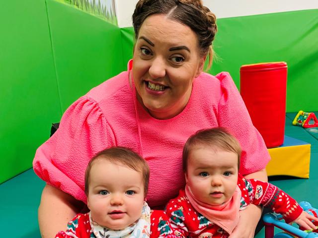 Kirsty Evans and her twin daughters Mia and Isabel