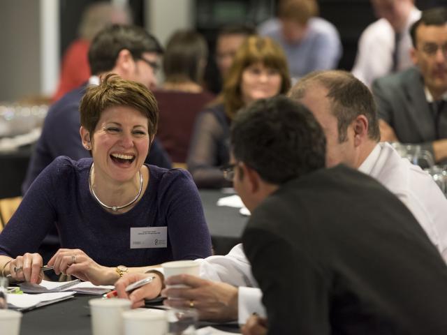 People chatting at event