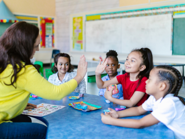 Social worker in a school with 4 students
