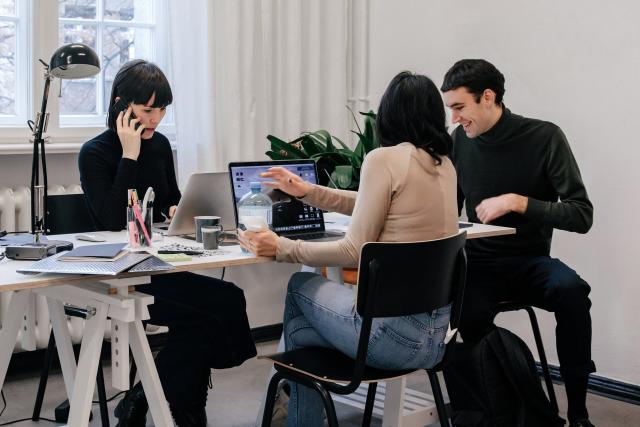 a group of people in a meeting