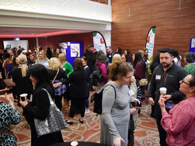 Conference attendees chatting