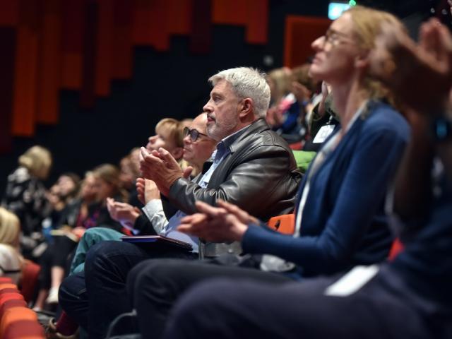 Audience applauding