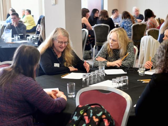 seminar participants working together