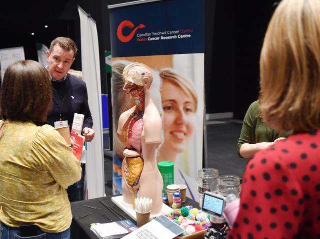 Member of the public engaging with an exhibit