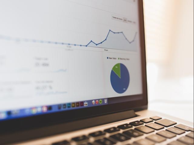 Laptop screen showing data plots