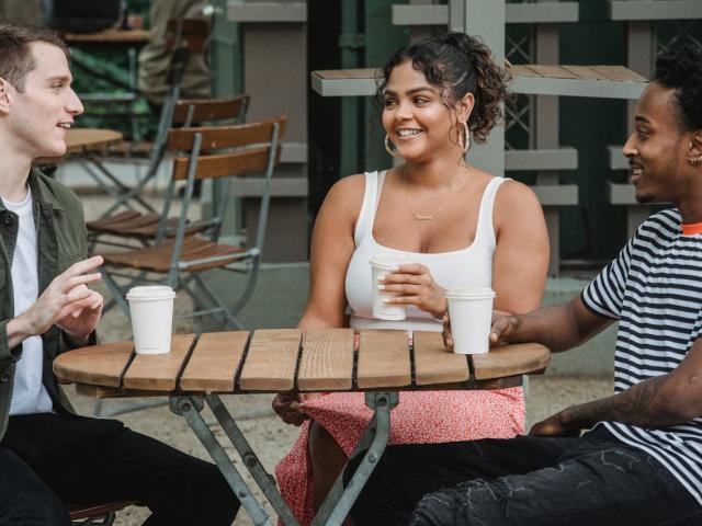 Diverse group of young people in discussion