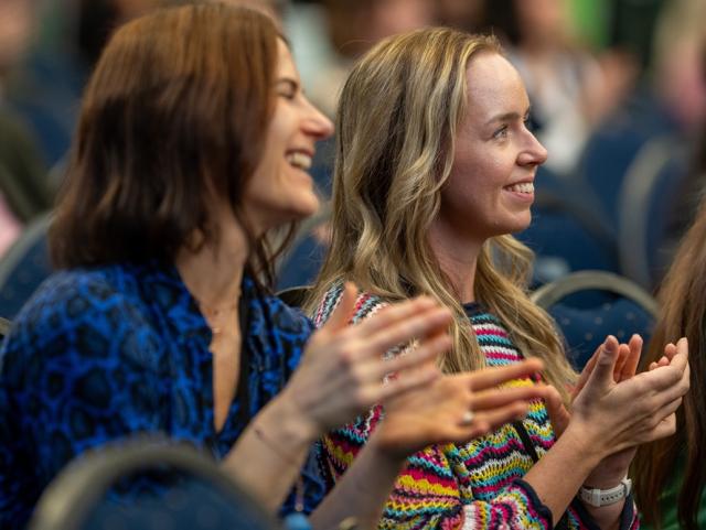Two smiling women