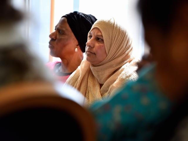 two women listening
