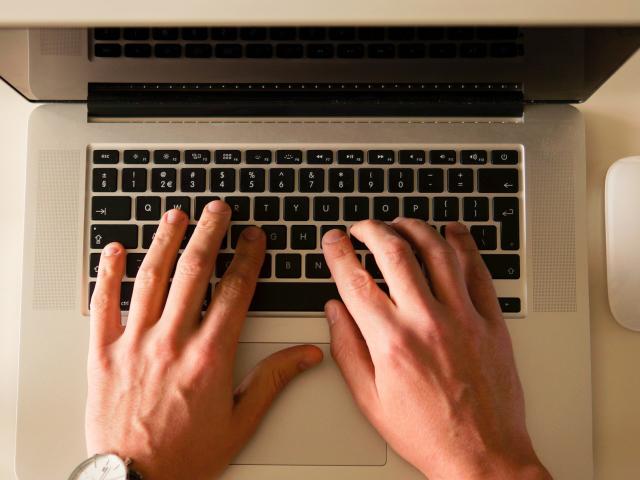 hands_typing_on_a_laptop