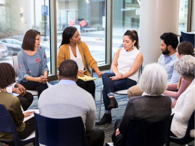 a group of people chatting