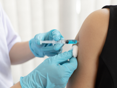 Vaccine being given to woman