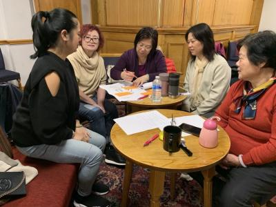Five women of chinese origin attending an allyship event.