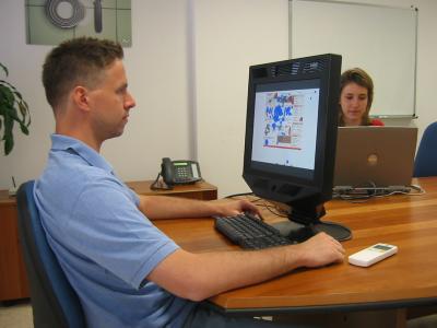 A researcher conducting an eye-tracking test. 