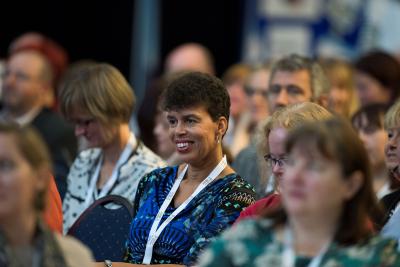 conference delegates smiling