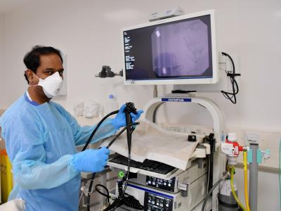 Dr working on medical equipment
