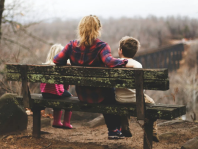 woman sitting with children