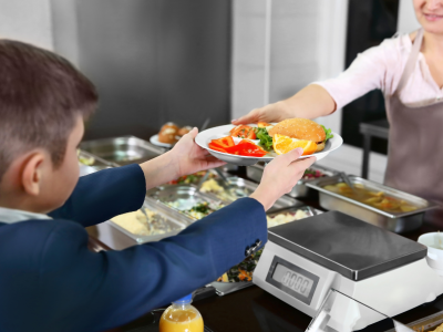 Child getting a meal at school.